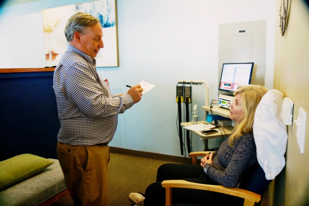 Dr. Zimmerman reviewing results with a neuropathy patient in Scottsdale